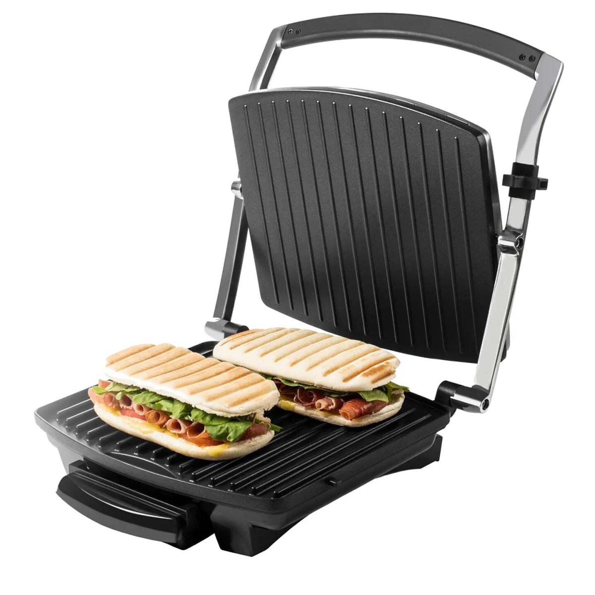 La Ursus Trotter Panini 80° es una potente y versátil sandwicheras y parrilla eléctrica diseñada para preparar deliciosos paninis, sándwiches y otros alimentos con un acabado crujiente y dorado. Con una potencia de 2000W, garantiza un calentamiento rápido y uniforme, ideal para quienes buscan rapidez y eficiencia en la cocina.

CARACTERISTICAS 

Potencia 2000 Watts.
Gran apertura de 180° para cocinar alimentos de gran tamaño.
Incluye 2 placas asadoras ranuradas y 2 placas lisas anti-adherentes para una mayor versatilidad.
Placas aptas para lavavajillas para una limpieza fácil y rápida.
Bandeja removible para grasas y aceites para una cocina más saludable.
Con la Ursus Trotter Panini 80°, disfruta de comidas deliciosas y bien cocidas con la comodidad de un electrodoméstico eficiente y fácil de usar.